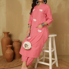 Women Solid Cotton Flex A-line Pocket Kurta with Palazzo Set