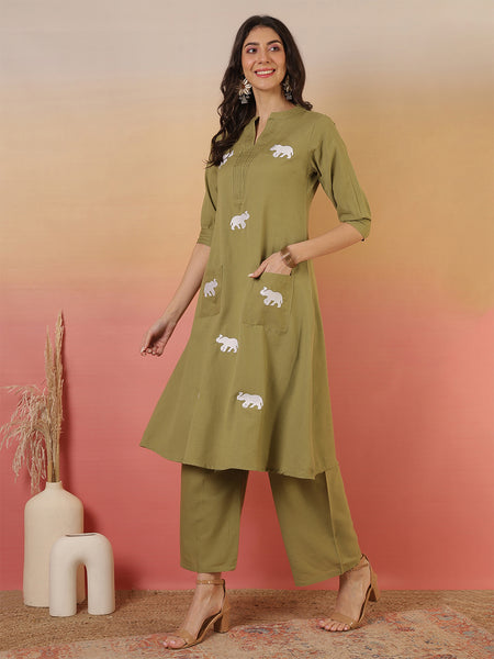 Women Solid Cotton Flex A-line Pocket Kurta with Palazzo Set